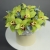 Композиция в шляпной коробке из 11 лаймовых орхидей в Жуковском