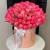 Композиция в шляпной коробке из 113 пионов Корал Шарм в Жуковском