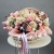 Композиция в корзине "Диодора" из французских роз Квиксенд, диантусов и кустовых пионовидных роз Бомбастик в Жуковском